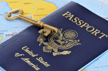 Travel concept image with passport and key