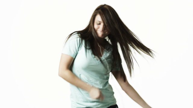 MS Young woman dancing against white background / Orem, Utah, USA