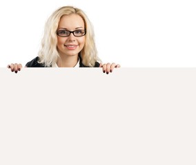 Women. Close-up of a young woman holding signboard