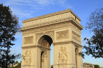 Fototapeta na wymiar Arc de Triomphe paris france famous landmark monument side view blue sky background photo