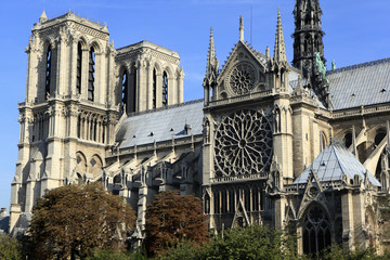 Notre Dame cathedral Paris France side view scene from River Seine with rose window photo