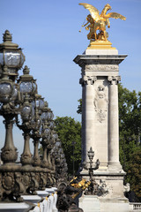 Fototapeta na wymiar Renaissance street lamps on Pont Alexandre III 3rd river seine alexander bridge Paris France