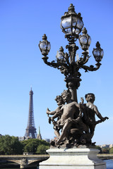 Renaissance street lamp on alexander bridge with Eiffel Tower in the distance photo vertical