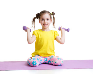 Active child exercising isolated on white background