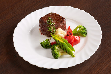 Delicious roasted meat with grilled vegetables