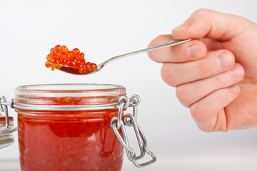 Red caviar in the jar