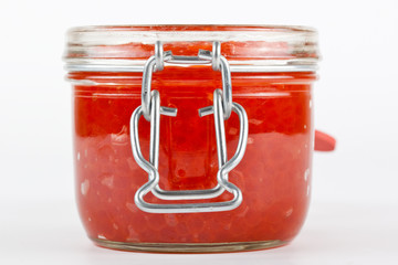 Red caviar in the jar
