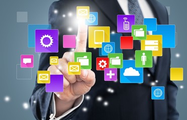 Naklejka premium Apps. Businessman touching social network icon