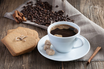 Coffee cup with cookies, cinnamon