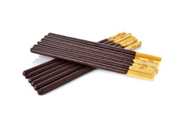 crackers stick and coated with back chocolate on white backgroun