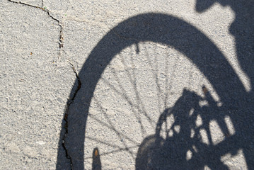 The shadow of bicycle wheel
