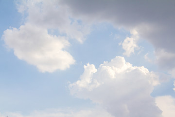 Fototapeta premium Dense clouds gathered in the sky, obscuring the light from the s