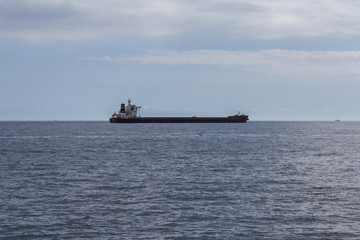Oil Tanker ship on ocean horizon