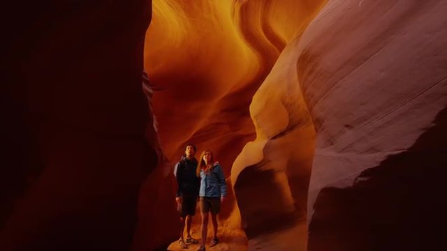 Panning shot of tourists sightseeing in Canyon X / Canyon X, Arizona, United States, 