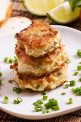 Homemade chicken cutlets sprinkled with green onion, selective f