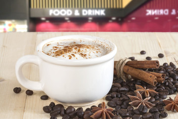 cup of coffee on brown background