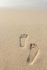 sand beach with footprints
