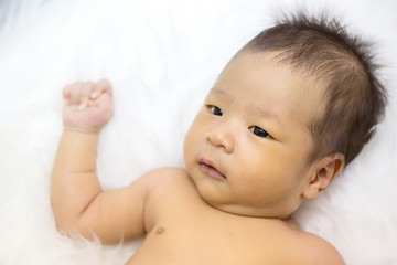 Studio portrait of an Asian baby