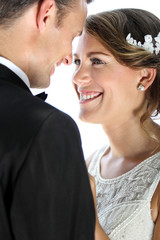 bride smiling and staring into her groom