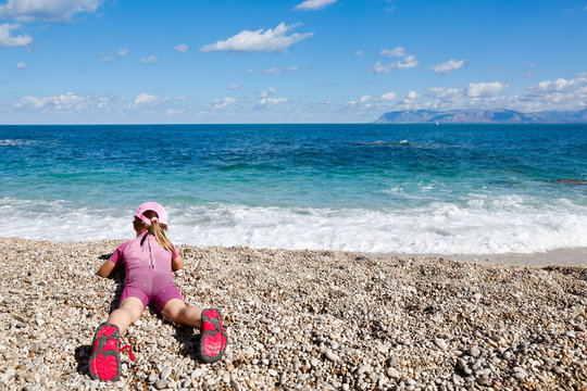 Girl enjoying free time on the beach