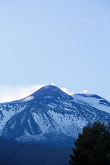 Fototapeta na wymiar Summit of Mount Etna, spewing ash and gasses
