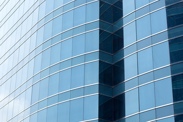 Blue office glass windows background, Asia.