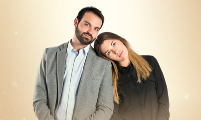 Cute couple over white background.
