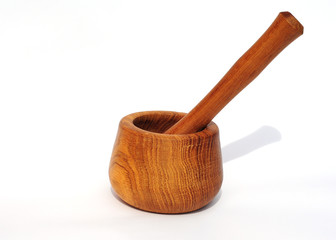 Wooden mortar and pestle  for grinding spices. Isolated