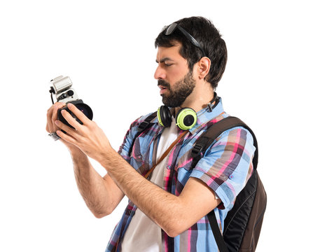 Tourist holding a video camera