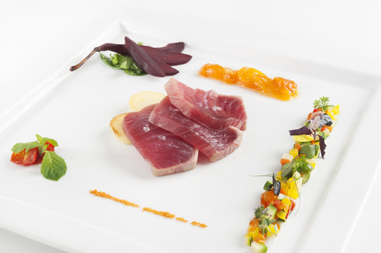 tuna Salmon sashimi with withe plate isolated on white backgroun