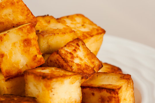 Closeup image of ghee fried Indian paneer (cottage cheese) cubes
