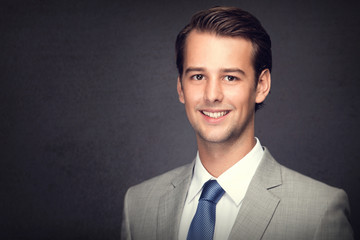 young businessman smiling