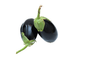 Couple of whole purple aubergine isolated
