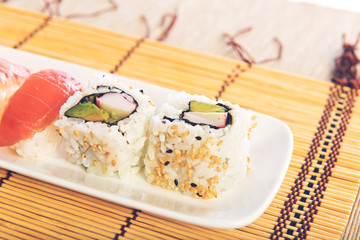 Sushi food over wooden background
