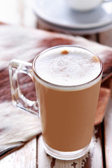 a glass of coffee latte