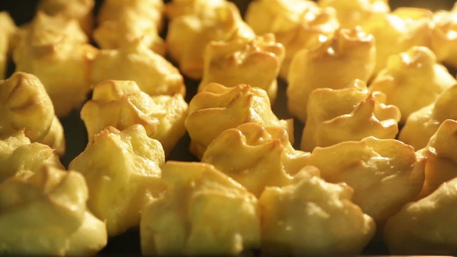 Time lapse close up HD video of baking eclairs 