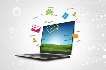 Laptop on green grass