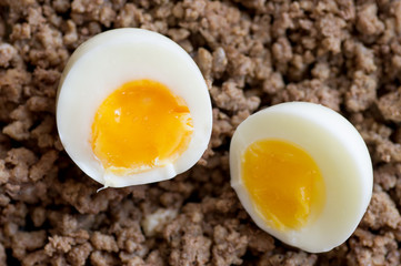 Two halves of hard-boiled eggs