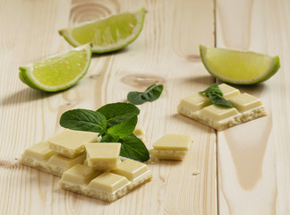 White chocolate with mint and lime, selective focus