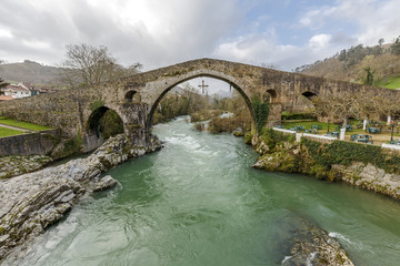 Fototapeta na wymiar Roman stone bridge in Cangas de Onis