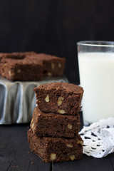 Chocolate brownies on a dark background