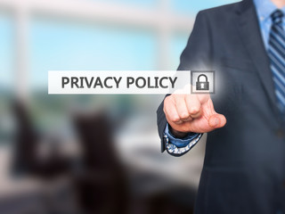 Businessman pressing Privacy Policy button on virtual screen