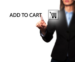 Businesswoman pressing add to cart button on virtual screen