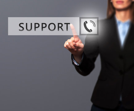 Businesswoman pressing support button on virtual screen