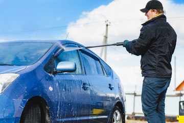 Blue car washing on open air