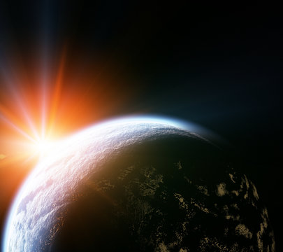 Our earth in cosmos and bright sun. Elements of this image furni
