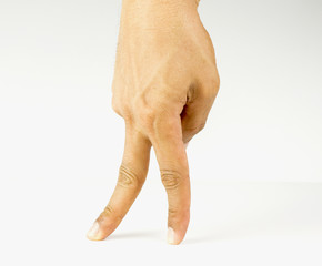 Fingers walking on white background