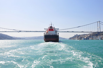 Large Cargo Tank passing the bosphorus bridge, Istanbul, Turkey