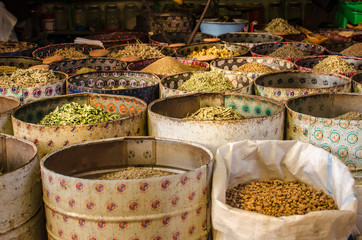 Spice seller in a market, Morocco