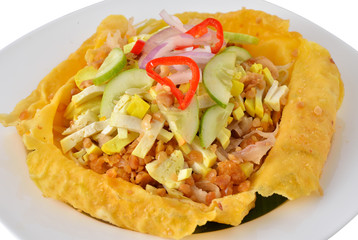 Vietnamese stuffed crispy egg crepe on plate